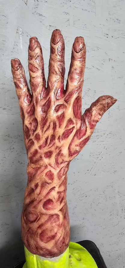 Burnie Freddy lookalike burnt silicone hand sleeve — left hand view