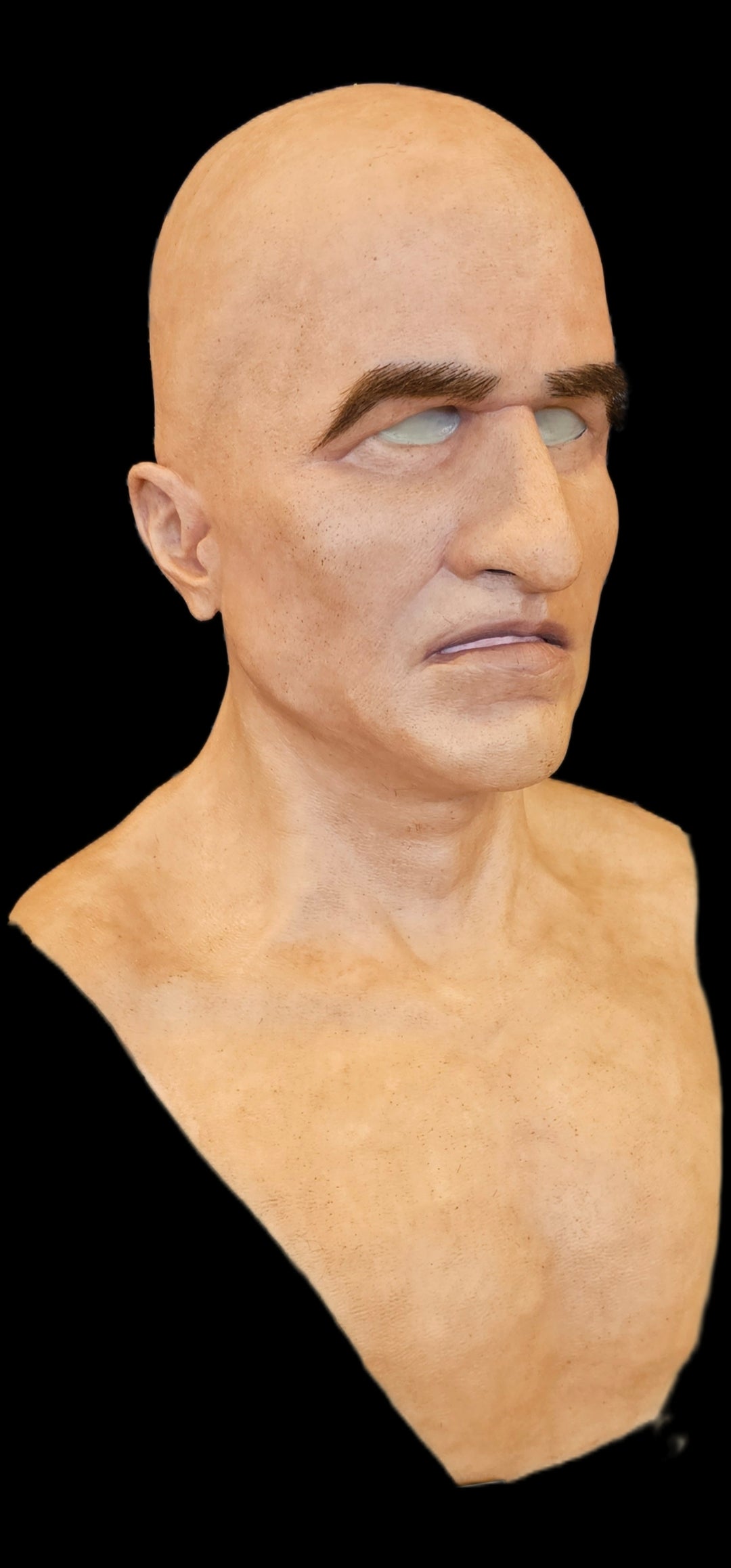 Bald young man silicone mask right side front