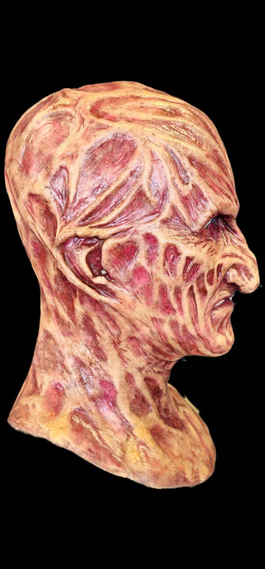 Freddy lookalike mask worn in full costume