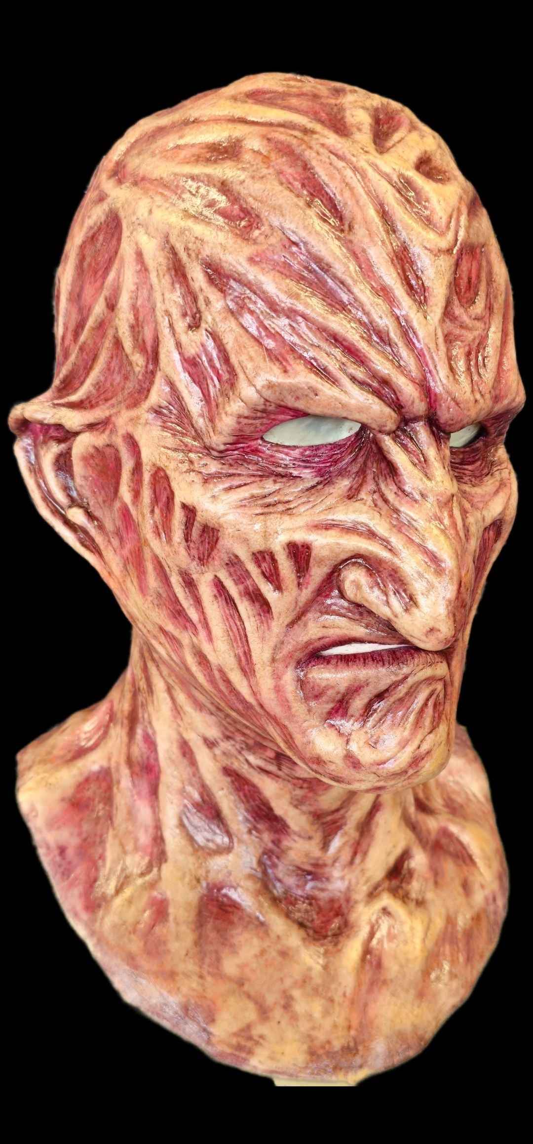 Burnie silicone mask — rear view showing full head fit
