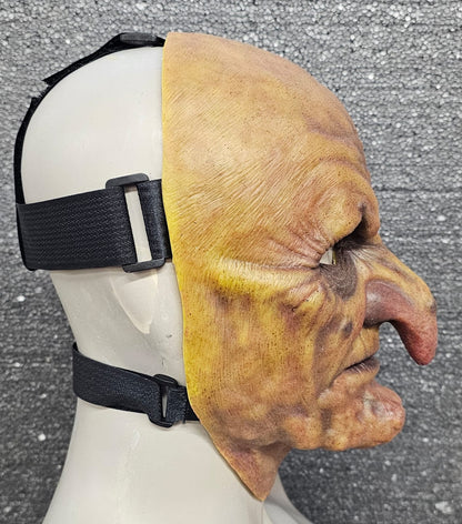 Old Hag silicone witch mask in Putrid finish, right-side view showing the adjustable straps