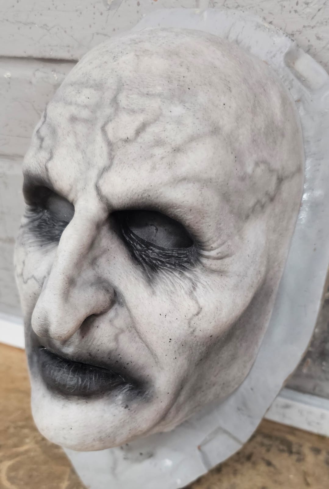 Realistic Evil Nun silicone mask, left side view
