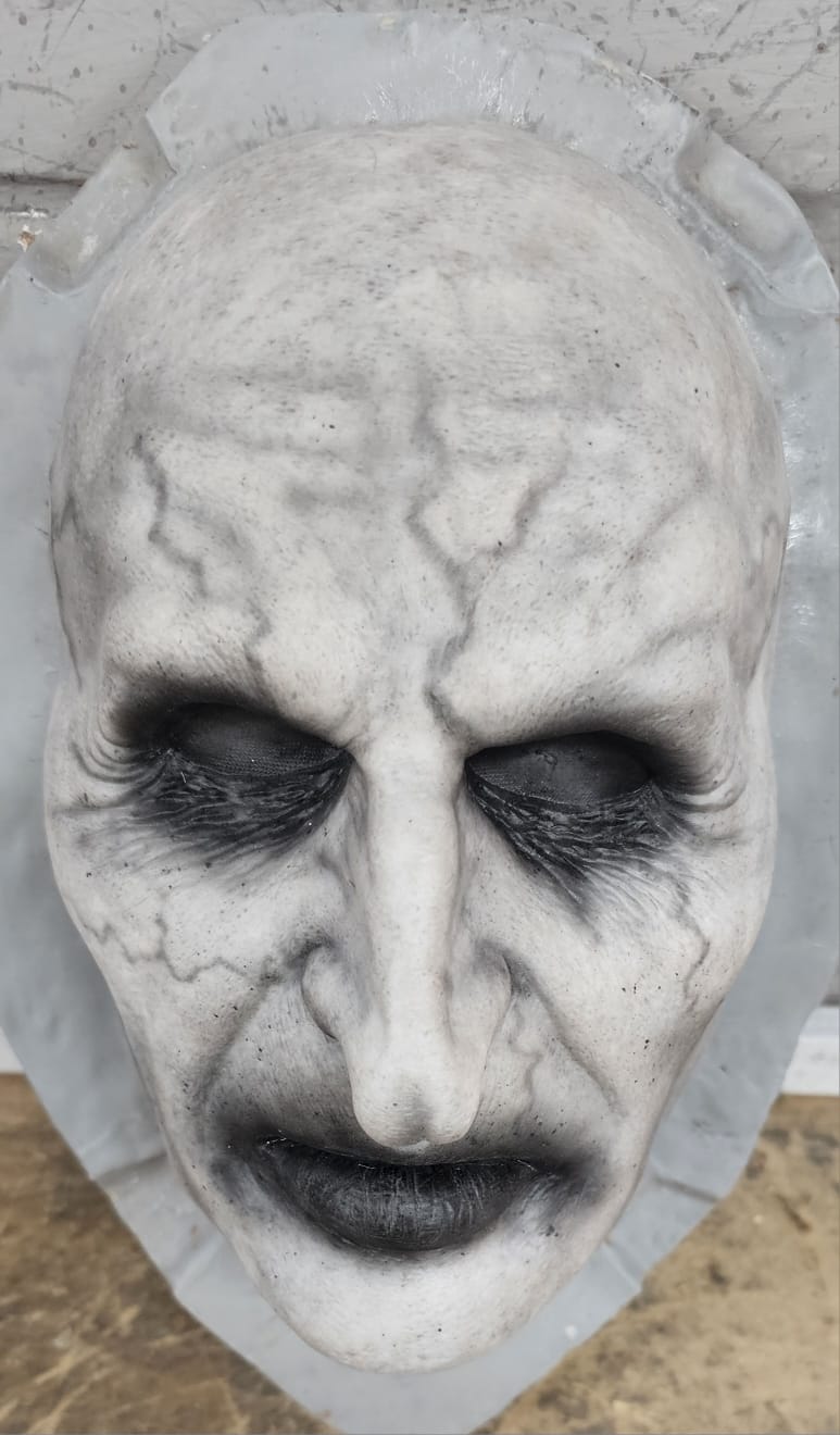 Realistic Evil Nun silicone mask, viewed from above and in front